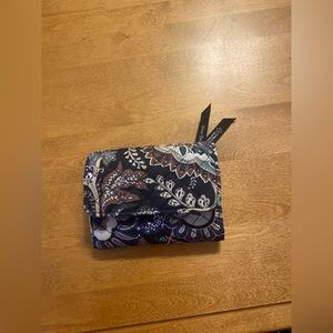 Vera Bradley tri fold wallet. Holds 15 credit cards. Coin pocket, room for bills